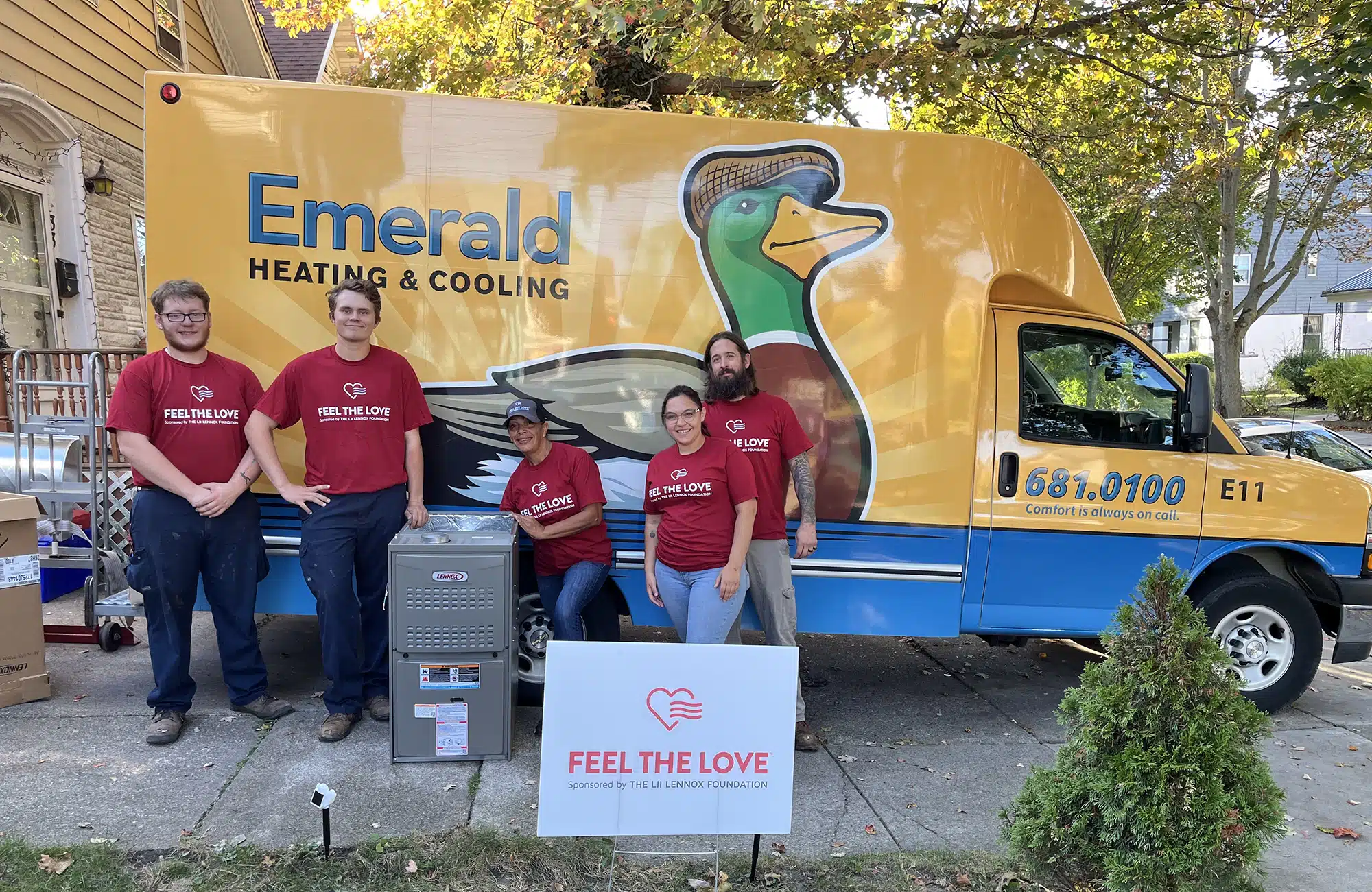 Emerald Heating & Cooling's six-member Feel the Love team with a donated Lennox furnace and AC system in Western NY.