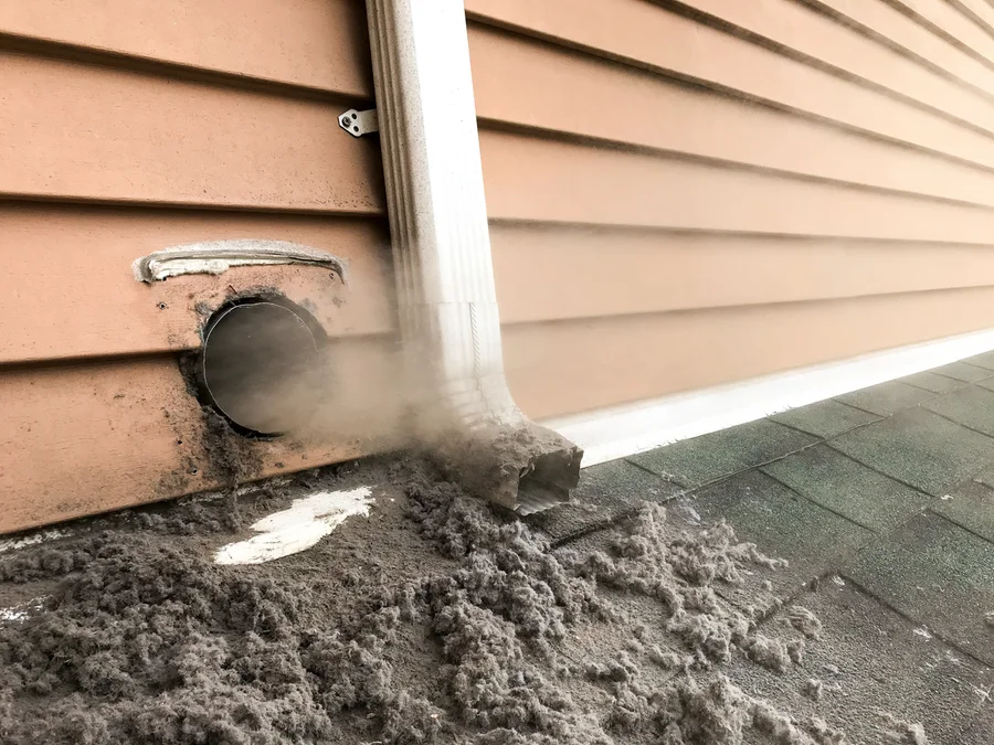 Massive lint buildup expelled from a clogged dryer vent — a leading cause of house fires in Buffalo area homes